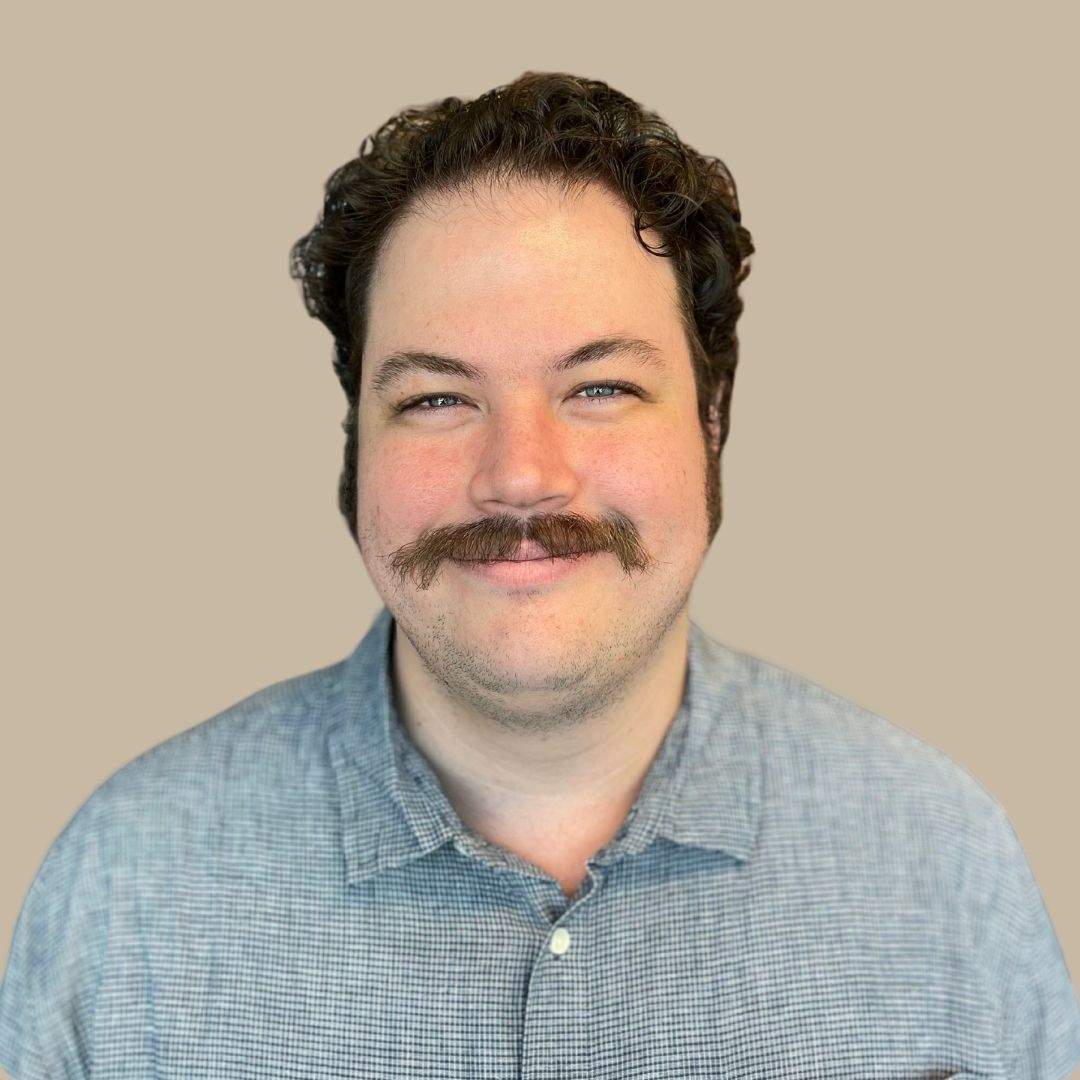Headshot of Sam Kennedy